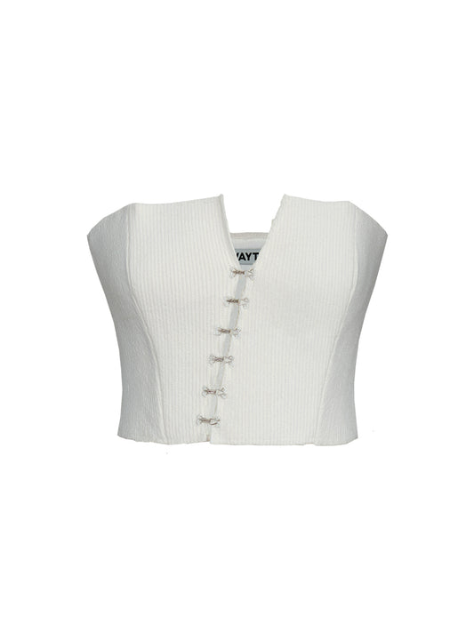 Kırık beyaz kancalı asimetrik crop korsenin ön dekupe görünümü